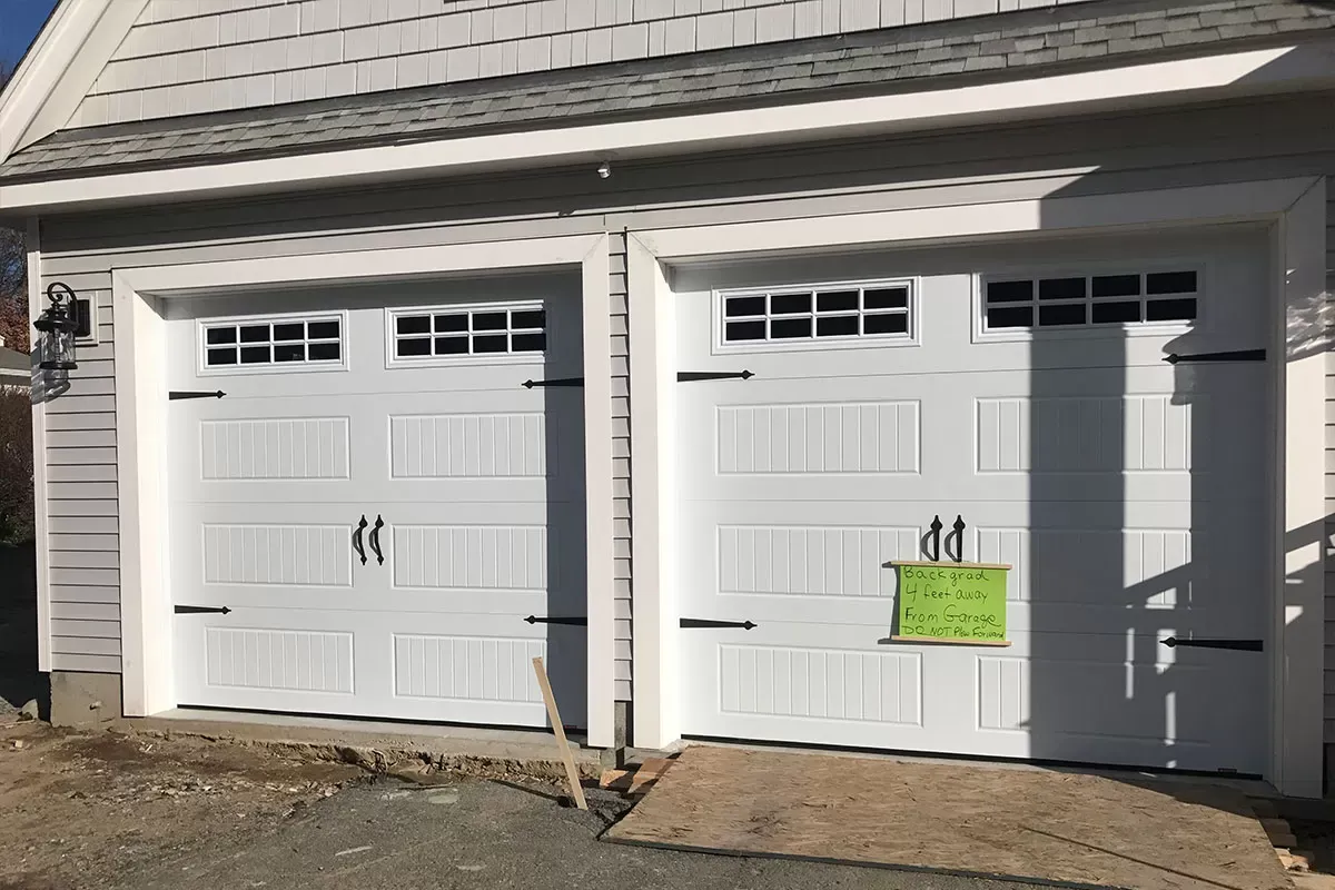 imageye___-_imgi_7_track-and-roller-inspection-somerville garage door repair Framingham