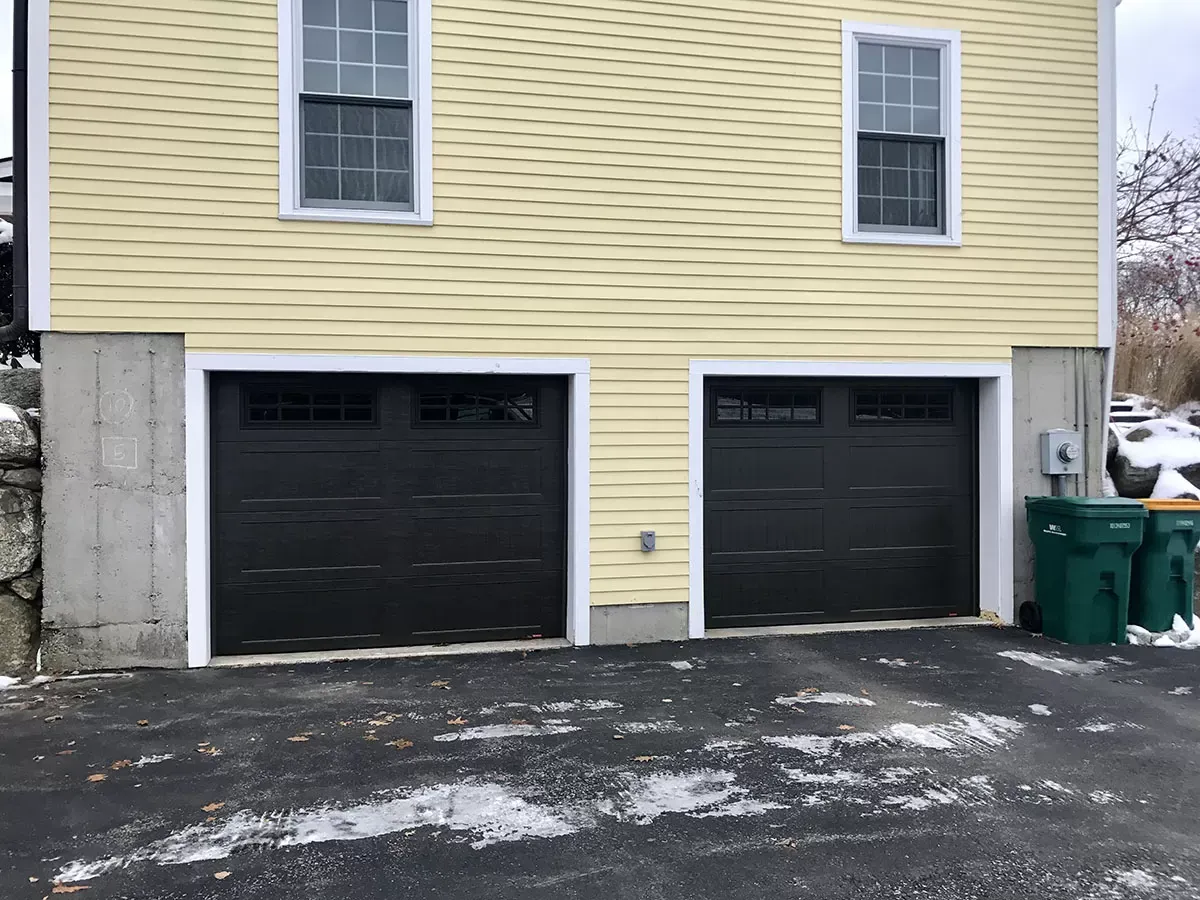 Residential Garage Door Spring Repair Professional Garage Door Repair in Dedham restoring a broken residential garage door spring