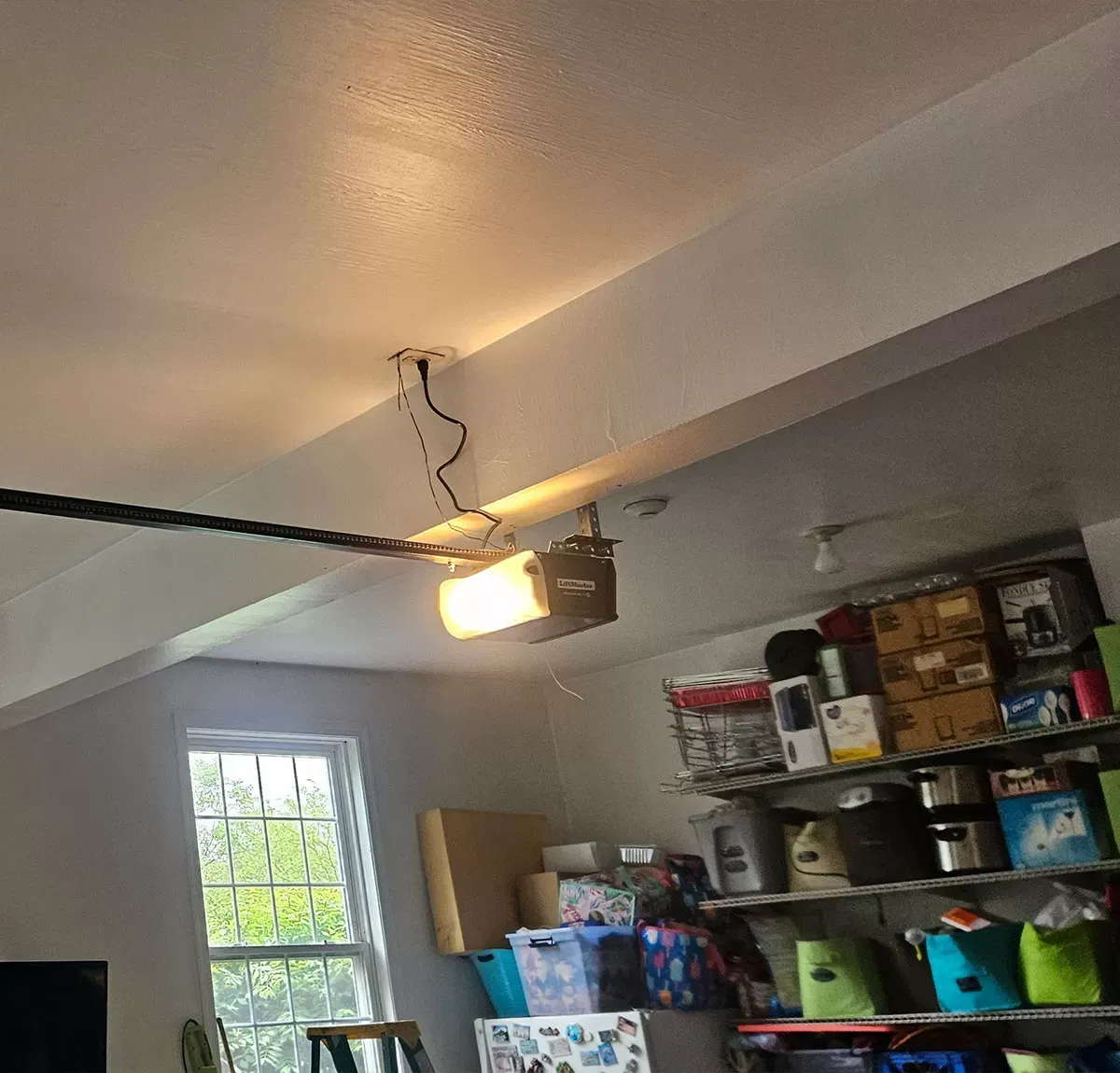 Garage Door Spring Repair Technician Expert Garage Door Repair in Cambridge replacing broken garage door springs safely