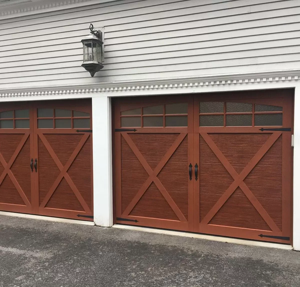 Garage Door Opener Repair Service Expert Garage Door Repair in Dedham fixing a malfunctioning garage door opener